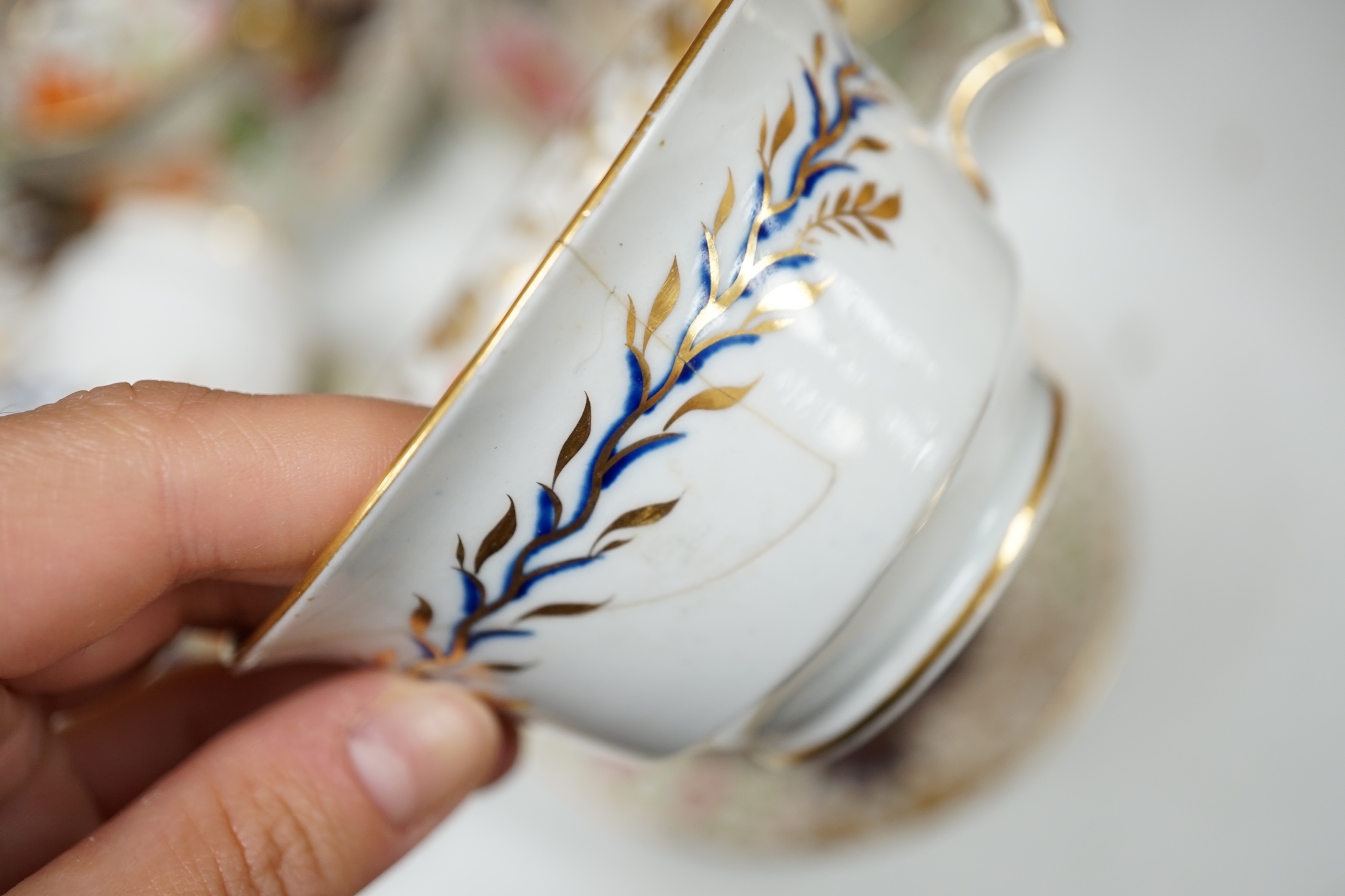 An early 19th century London shape part tea set, probably Coalport. Condition - some damage